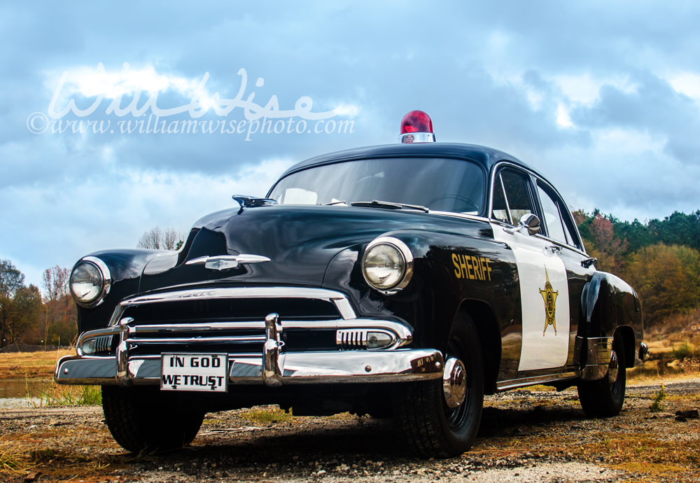 Classic antique car restored to an old time Sheriff patrol car Picture